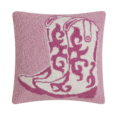 Coussin en laine rose avec bottes de cowboy