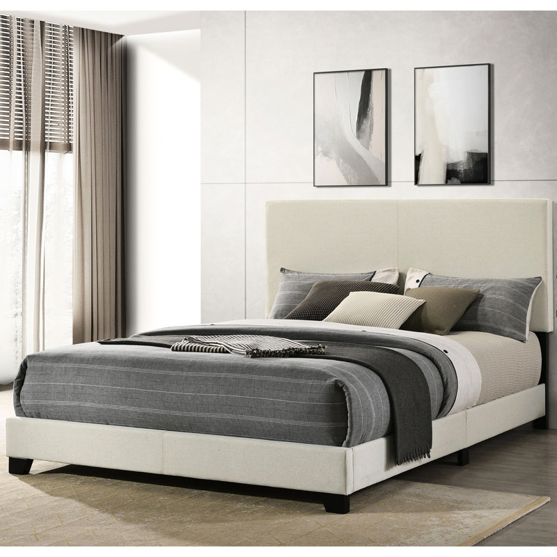 Grand lit à panneau tapissier crème avec tête de lit rembourrée, bois d'hévéa et bois d'ingénierie, pieds en bois massif noir, mousse confortable pour installation dans une chambre à coucher moderne, pieds pour