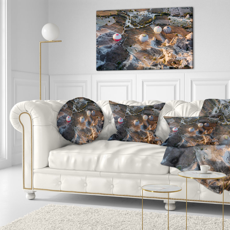 Coussin lombaire imprimé vol avec ballons au lever du soleil