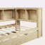 Lit de jour simple avec lit gigogne, armoires de rangement et ports USB
