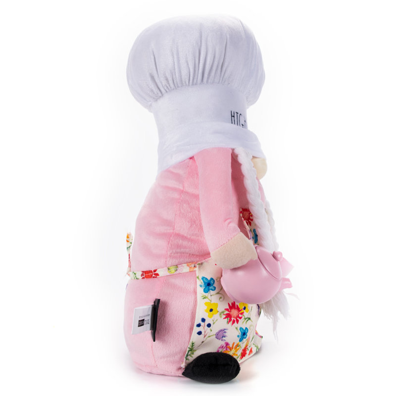 Gnome de printemps moelleux avec théière