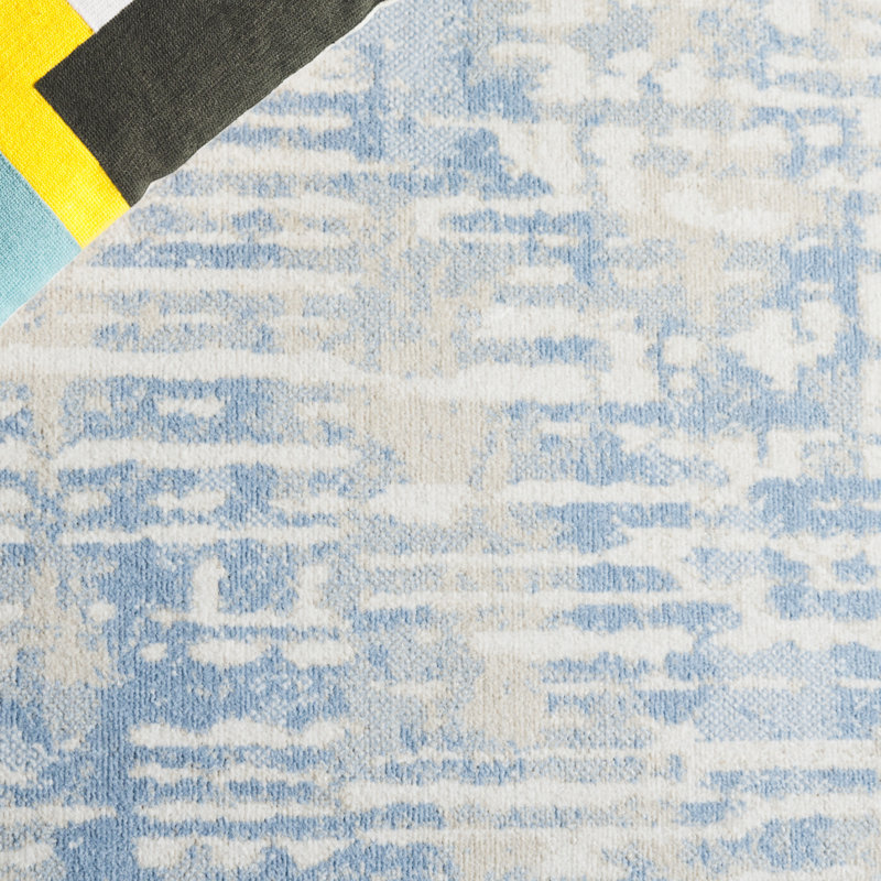 Ivory and Blue Abstract Synthetic Rectangular Area Rug