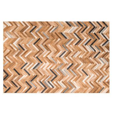 De Los Bosques Cowhide Chevron Area Rug in Sandy Brown