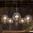 Mansurah 5-Light Shaded Wagon Wheel Black/Brass Chandelier