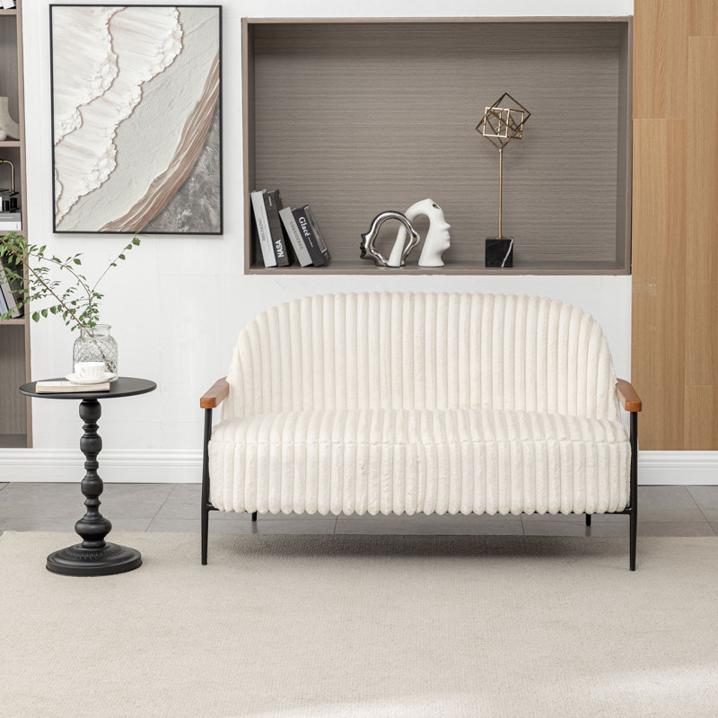 Canapé capitonné Megham avec pieds en fer, Beige