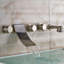 Robinet de baignoire mural à trois poignées en nickel brossé - Design élégant avec douche à main