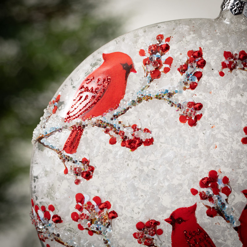 Ornement boule peinte en forme de disque cardinal