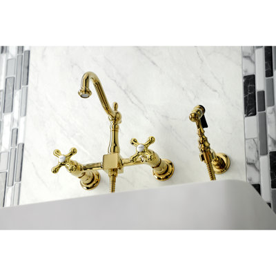 Kingston Brass Heritage Double-Handle 3-Hole Wall-Mount Bridge Kitchen Faucet with Brass Sprayer