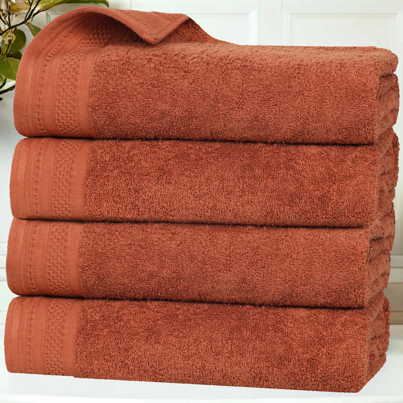 Serviettes de bain mi-longues en coton gaufré texturé Honeycomb, Rouille