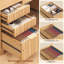 Bureau en L avec prises Rachmiel-1287549004