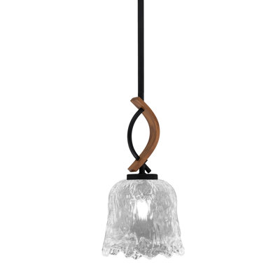 Suspension Hallmann Stem Hung Mini présentée en noir mat et en métal peint imitation bois avec verre lave transparent de 18 cm