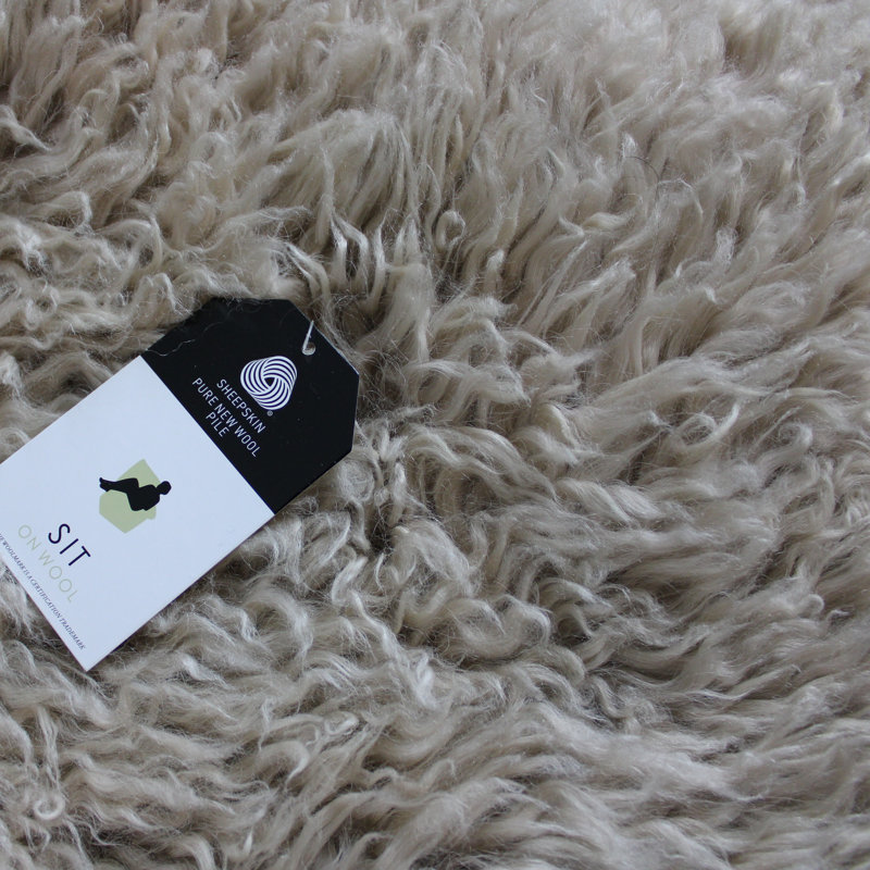Radhika Curly Sheepskin Rug in Beige
