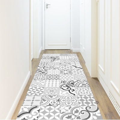 Alantra Vinyl Machine Printed Area Rug