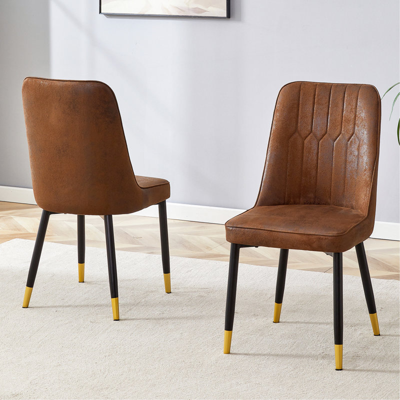 Ensemble de chaises de salle à manger en velours brun avec pieds en métal noir et décoration dorée