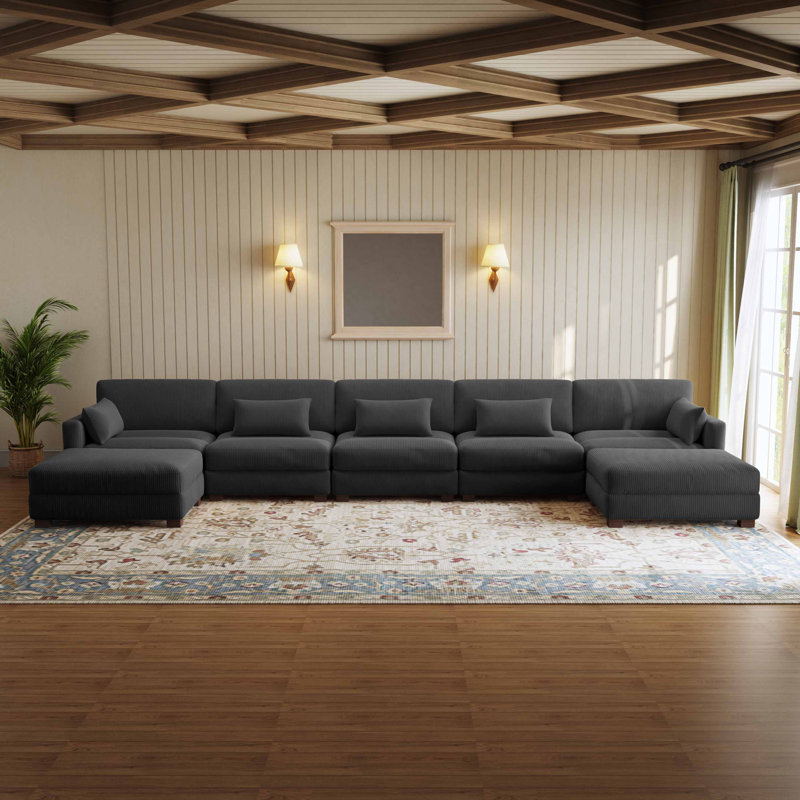 Canapé modulaire rembourré en velours côtelé 7 pièces Maelina avec dossier coussiné et repose-pieds amovible Maelina