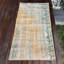 Petit tapis brun rétro idéal pour les vestibules avec un design turc rustique et un aspect antique