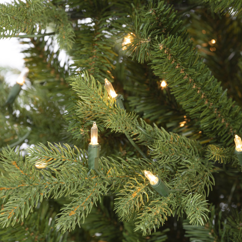 4Ft Pre Lit Potted Natural Cut Blue Spruce With 100 Lights And 605 Branch Tips