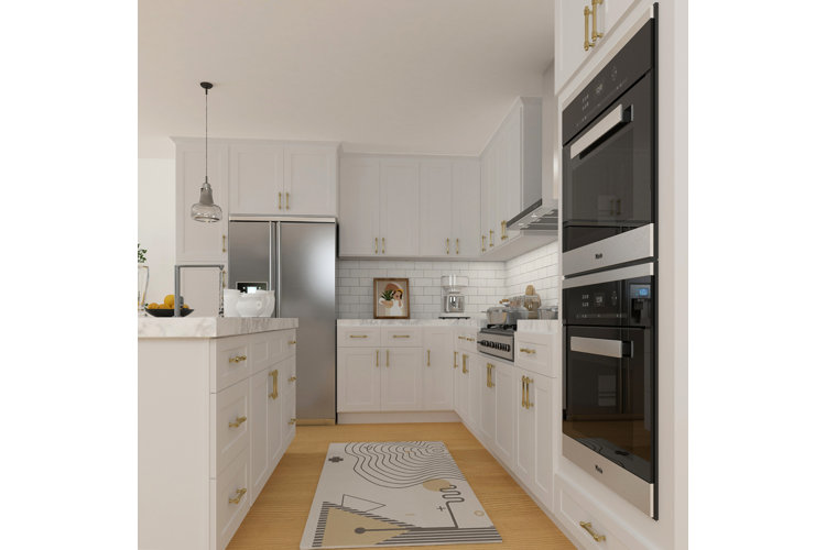 White galley kitchen with a wall-mounted double oven, white cabinetry, white subway tiles, and a stainless steel refrigerator.