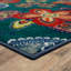Tapis bleu sarcelle à motif floral Kamberk-486525333
