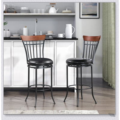 Chaise de pub pivotante avec structure en métal noir et revêtement en similicuir, parfaite pour les salles à manger et les bars modernes