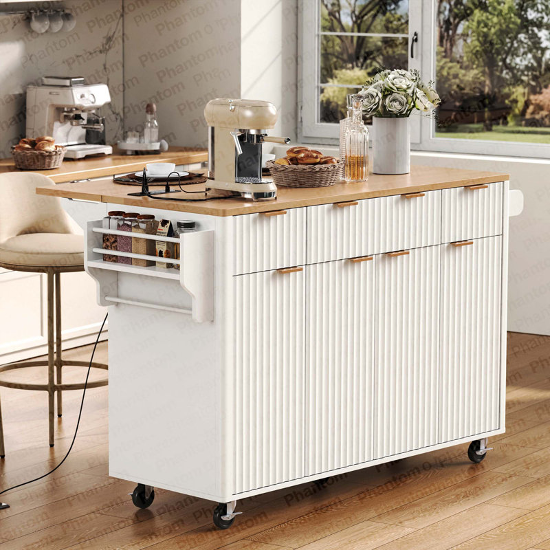 Îlot de cuisine cannelé avec rangement K&K, îlot de cuisine 55,5 po avec rallonge, prise de courant, 4 portes et 3 tiroirs, table d'îlot roulant avec plateau en grain de bois, rebord courbé pour la cuisine et la salle à manger - blanc