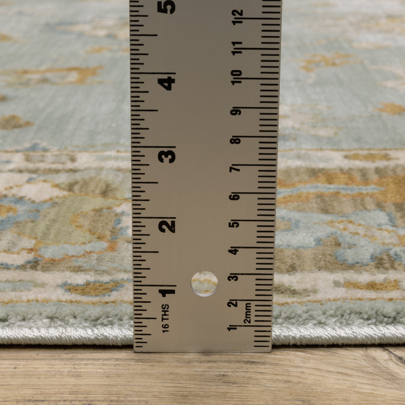 Tapis bleu sarcelle / rouille à bordure Graicyn, Rectangle 6 pi 7 po x 9 pi 9 po