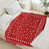 Motif de flocons de neige rouges