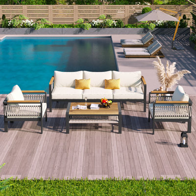 Ensemble de canapé modulaire d'extérieur 4 pièces pour 4 personnes avec ensemble de conversation pour terrasse avec coussins et table basse