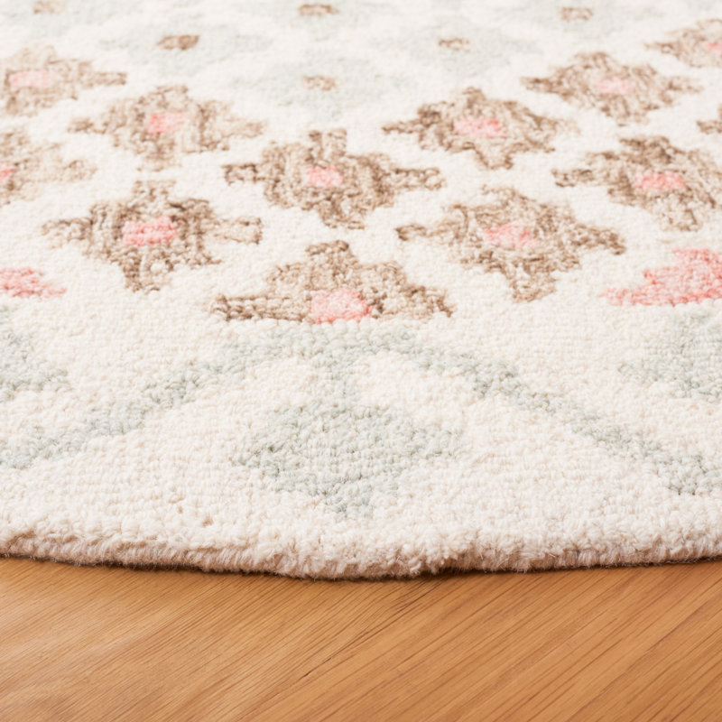 Aapri Hand Tufted Wool/Cotton/Latex Geometric Rug in Blue/Ivory, Round 6'