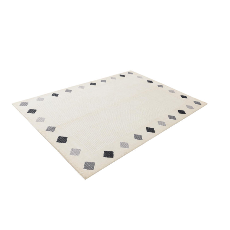 Tapis beige Iniguez