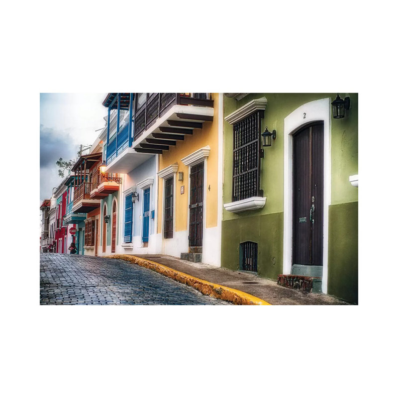 Low Angle View Of Houses On A Cobblestone Street by George Oze - Wrapped Canvas Painting, 20.32 cm H x 30.48 cm W