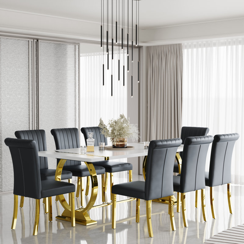 Ensemble de 8 chaises de salle à manger en cuir noir avec pieds dorés en miroir