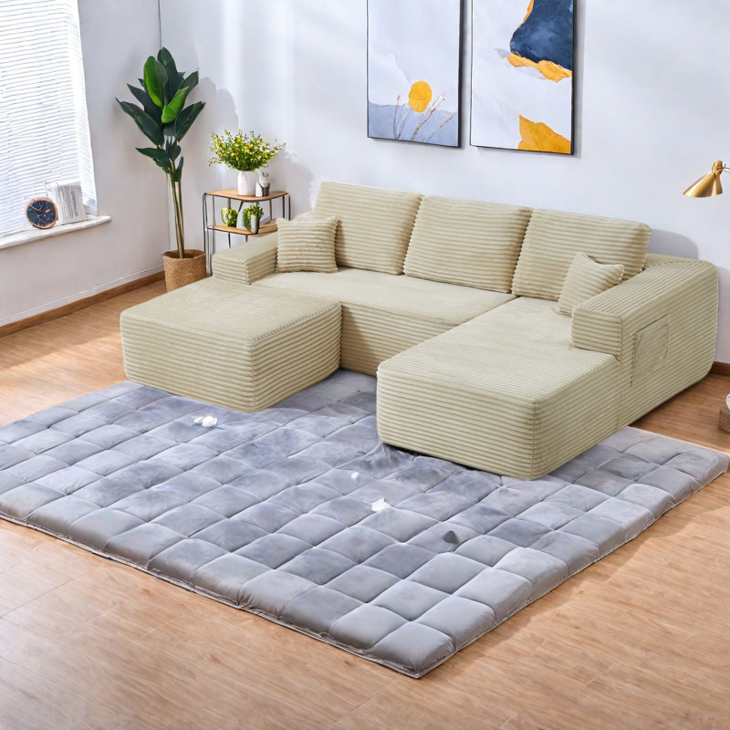 Canapés beiges confortables au design modulaire, tissu moelleux pour le salon