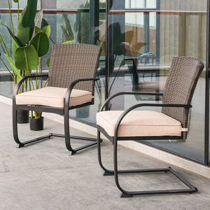 https://assets.wfcdn.com/im/32765650/resize-h300-w300%5Ecompr-r85/2213/221368801/Gamallo+Outdoor+Dining+Armchair+with+Cushion.jpg