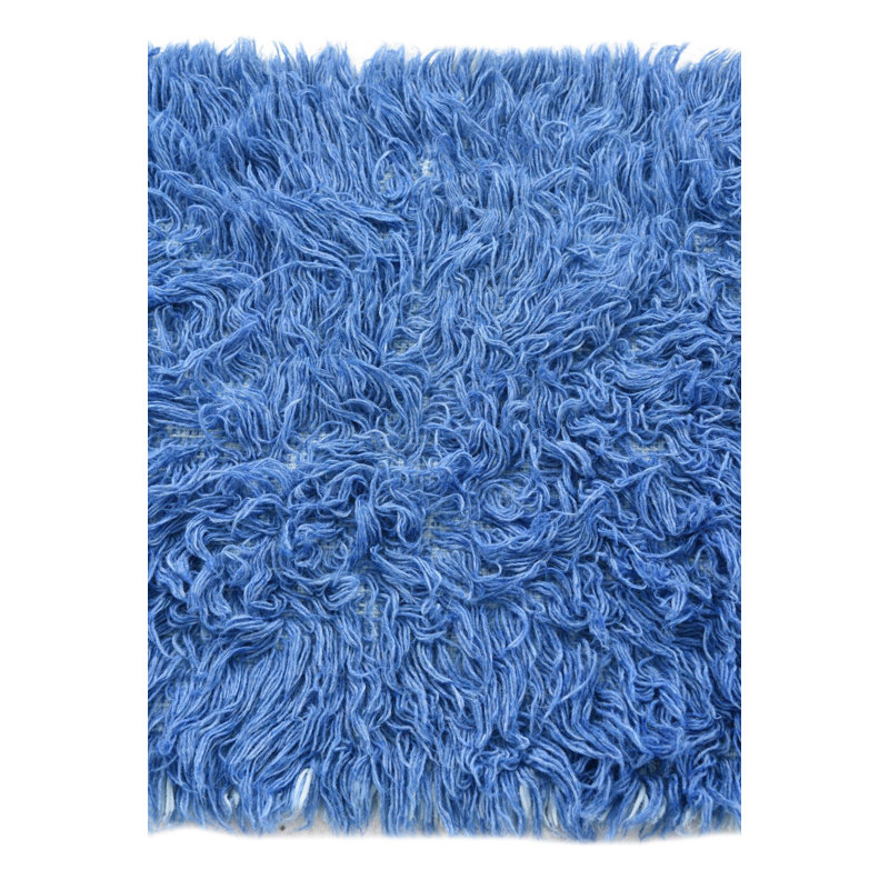 Tapis bleu Kalmanovitz