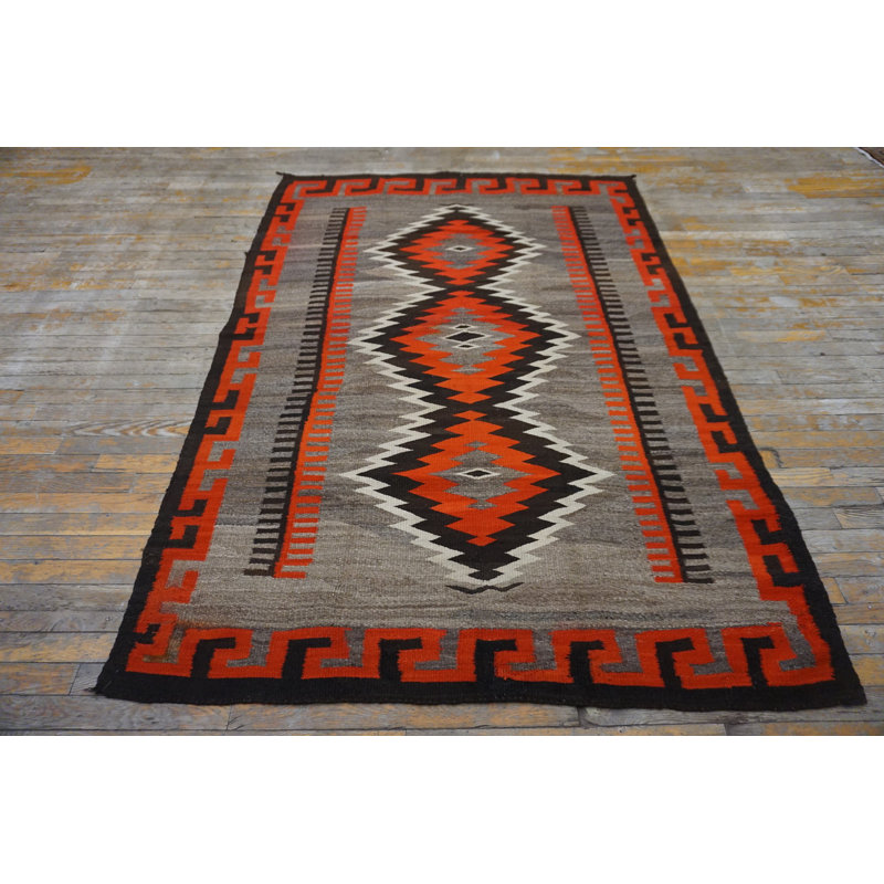 Tapis géométrique à tissage plat tribal