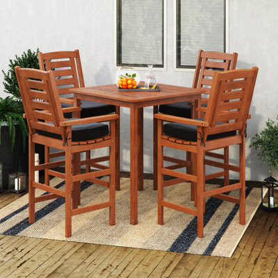 Gwenda 4 - Person Wood Patio Dining Set with Square Table , Cushions Included