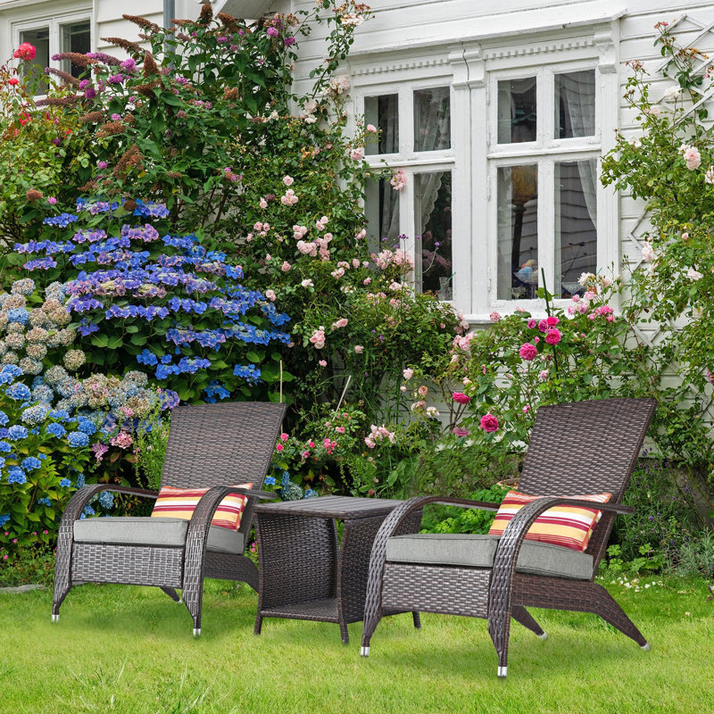 Chaise Adirondack d'extérieur en osier / rotin avec coussins