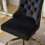 Fauteuil de bureau au design américain moderne, noir, revêtement en velours, pivotant et réglable, piètement en métal doré électroplaqué, boutons, finitions cloutées artisanales, confort durable pour un intérieur élégant, noir