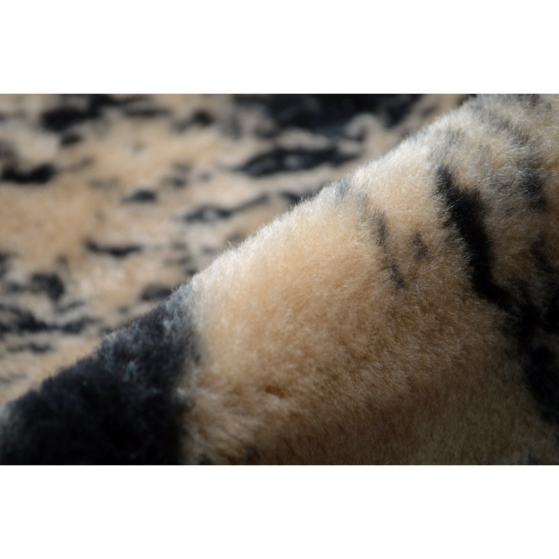 Betances Animal Print 150cm X 180cm Area Rug