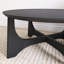 Table basse noire en bois-563889171