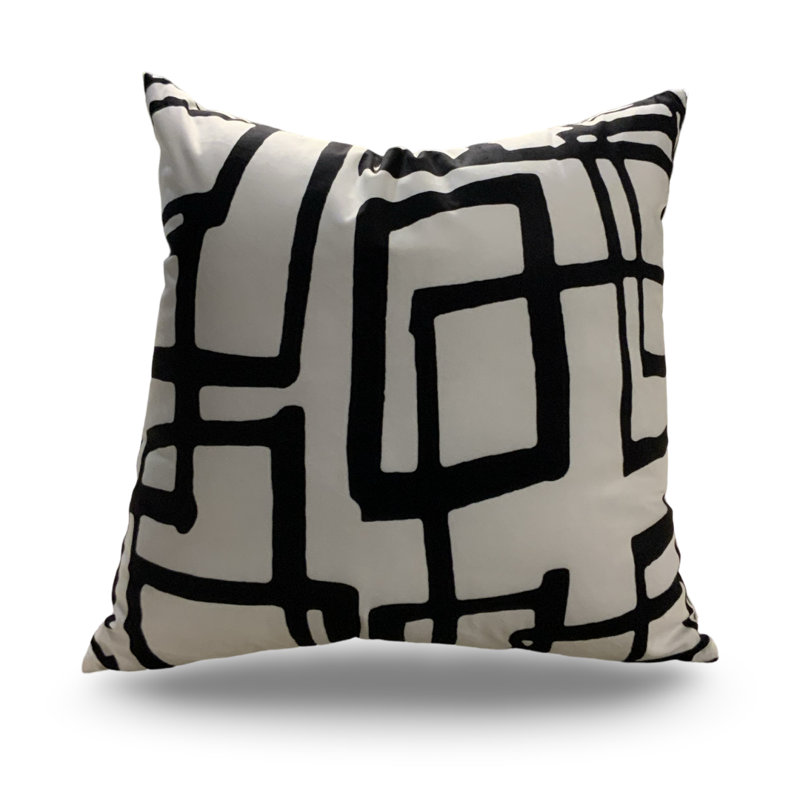 Coussin décoratif à motif géométrique abstrait - noir et ivoire