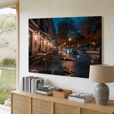 Canvas A Cozy Atmospheric Street Scene At Night Featuring A Charming Wall Art Caf Adorned With Warm Glowing Lights That Illuminate The Canvas Wall Art