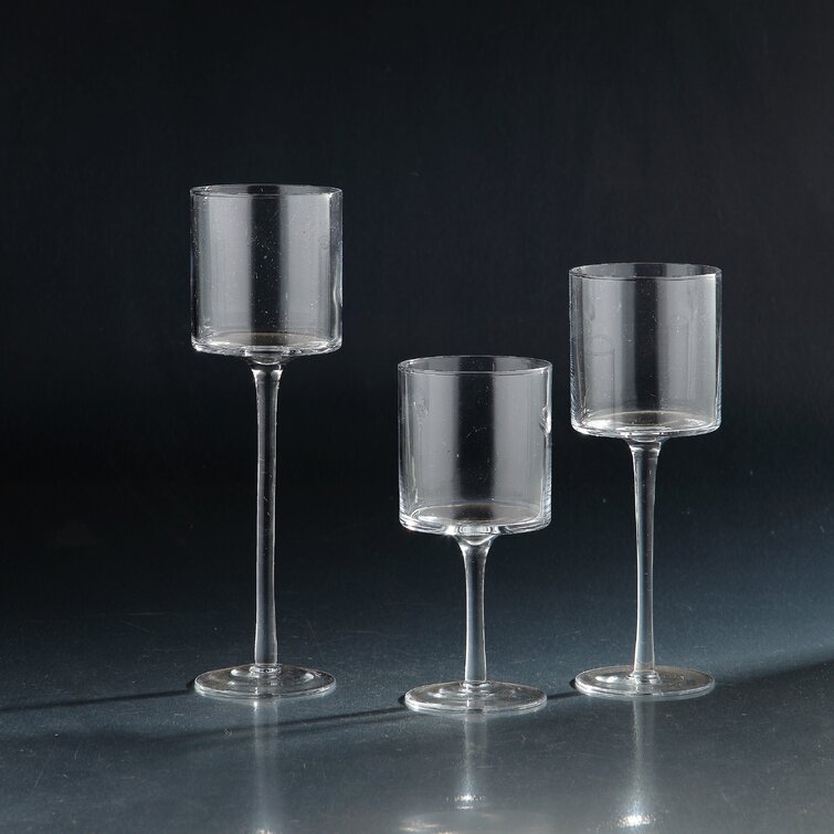 https://assets.wfcdn.com/im/32798343/resize-h755-w755%5Ecompr-r85/3145/31459132/Glass+Tabletop+Hurricane.jpg