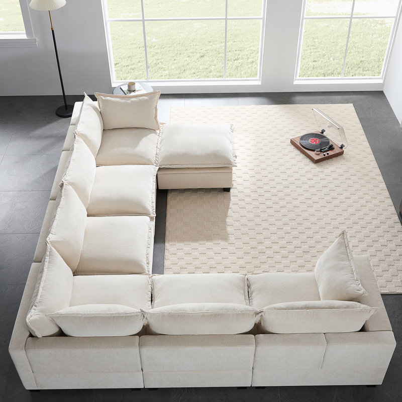 Canapé modulaire en forme de U de 117,5 po avec repose-pieds de rangement mobile et large pour des espaces de vie flexibles.