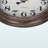 Liliya Round Wall Clock in Antique Brown, Transitional Style