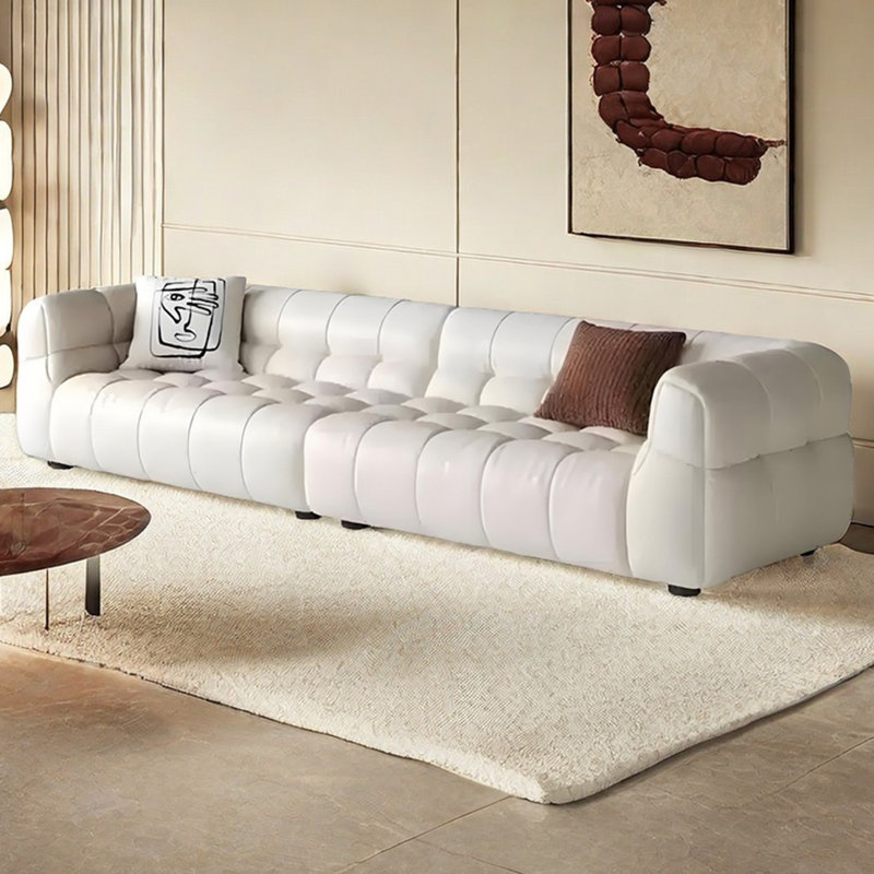 Canapé crème crème à motif de guimauve, H 27,55 po x l 135,43 po x P 40,15 po, 5