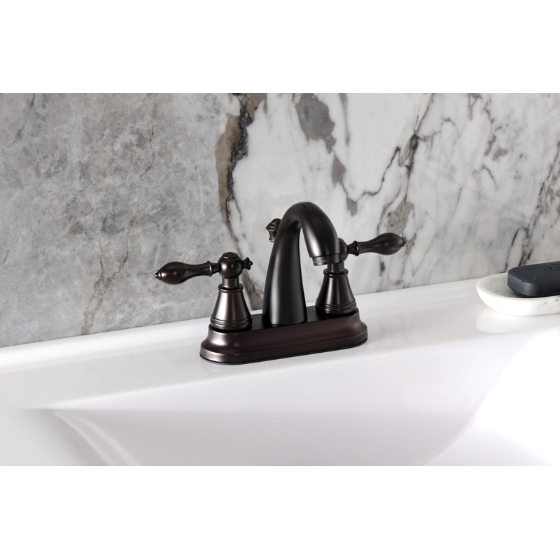 Robinet de salle de bain central à 4 poignées à 3 trous à fixation sur le comptoir Kingston Classic, Bronze frotté à l'huile