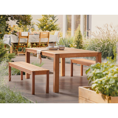 Dulcina 6 - Person Eucalyptus Rectangular Solid Wood Patio Dining Set with Cushions included
