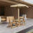 A foldable small outdoor leisure table and chair set with excellent materials includes 2 chairs and a rectangular table.